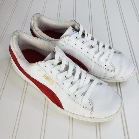 white pumas with red stripe